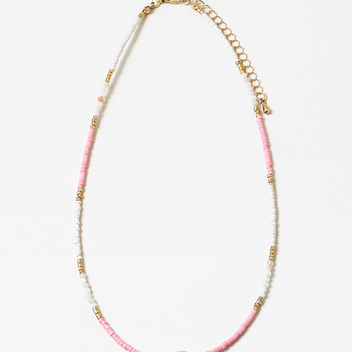 Necklace with pink, whitewith a central pink stone on a white background