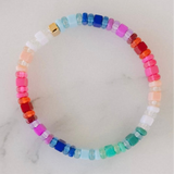 Picture of a multicolored bead bracelet in blues, purples, reds, pinks,whites and greens.