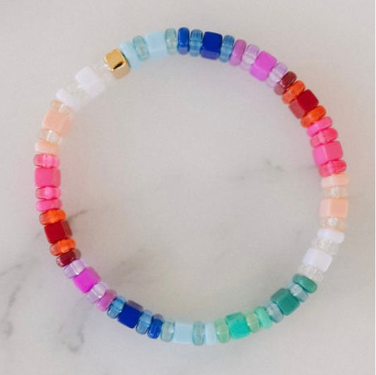 Picture of a multicolored bead bracelet in blues, purples, reds, pinks,whites and greens.