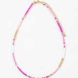 Dainty bead necklace in dark pink, light pink, gold and white beads.