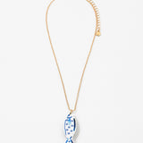 Necklace with a blue and white fish pendant on a white background