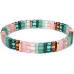 Picture of a bead bracelet in teals, browns, pinks and clear beads.
