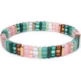 Picture of a bead bracelet in teals, browns, pinks and clear beads.