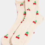 Picture of a pair of feminine white socks with small cherries all over them.