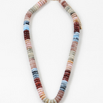Necklace with multicolored beads on a white background