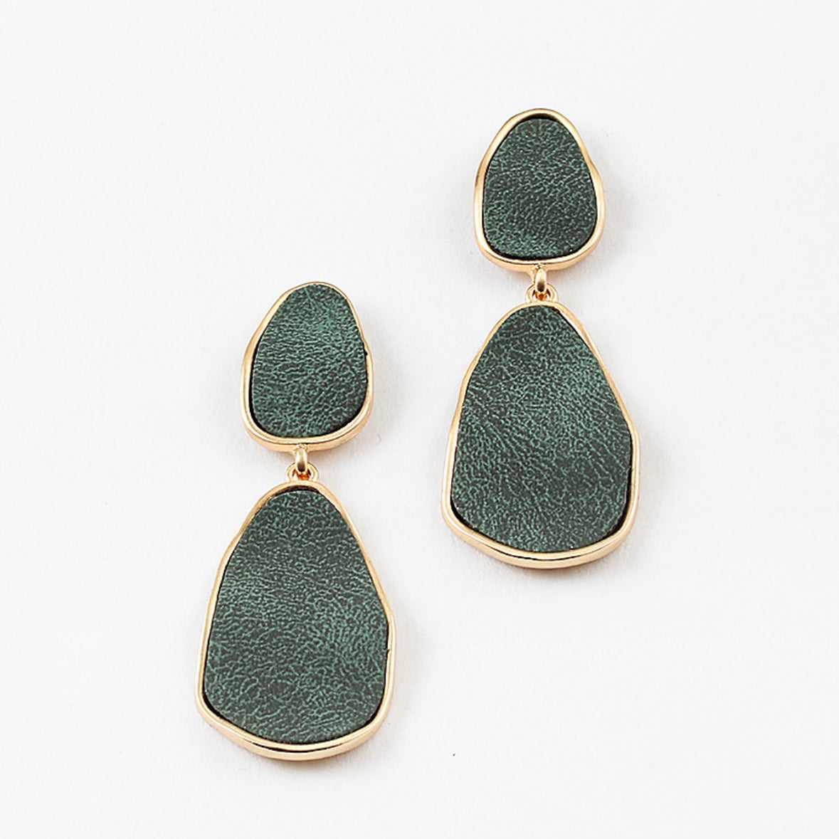 Dangle green teardrop earrings with gold accents on a white background