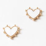 Small white enamel heart stud earrings with a gold bead trim.