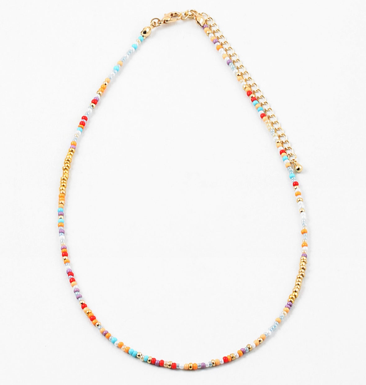 Colorful beaded necklace red, orange, gold and blue beads with gold chain on a white background