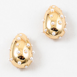 Picture of chunky gold tear drop studs with small pearls inlaid all over.