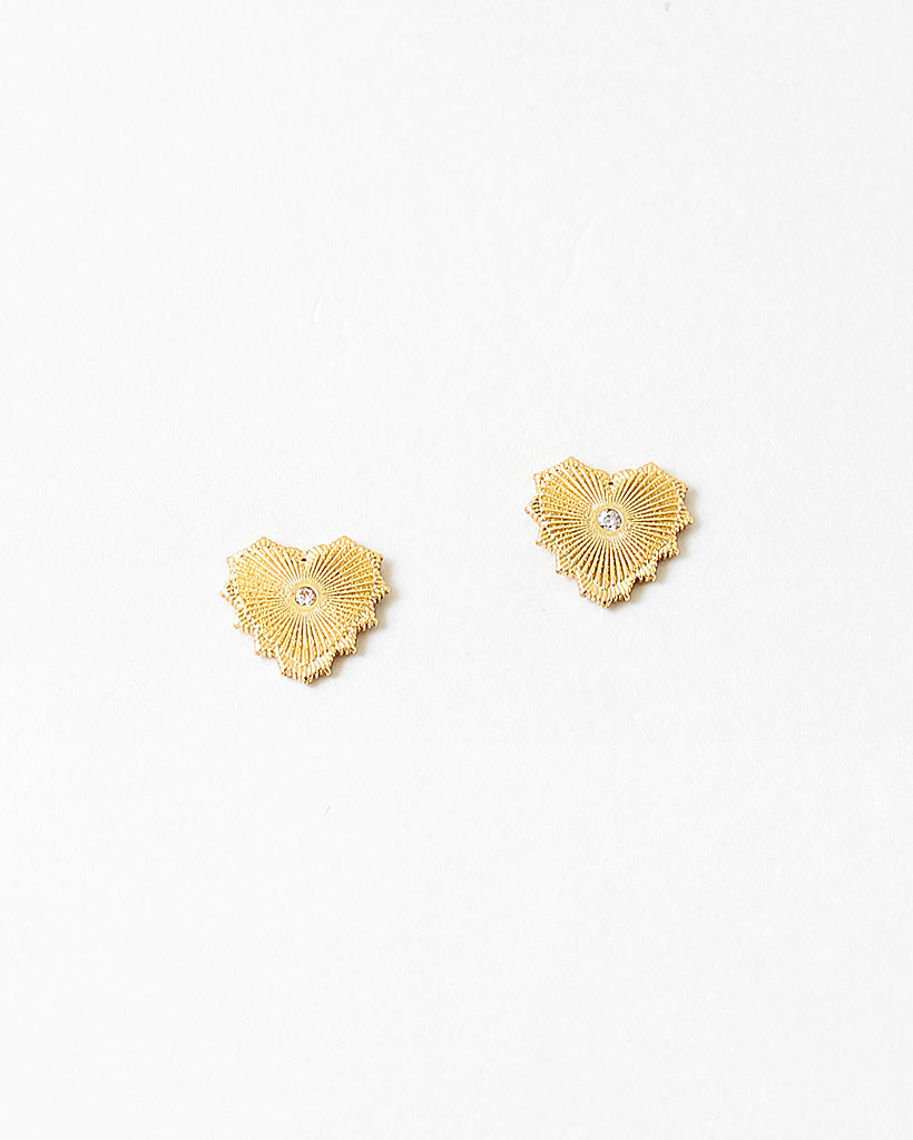 Gold heart-shaped earrings on a white background