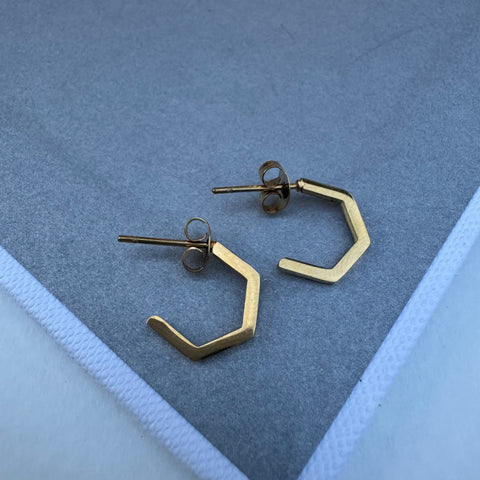 Picture of small gold geometric hoops
