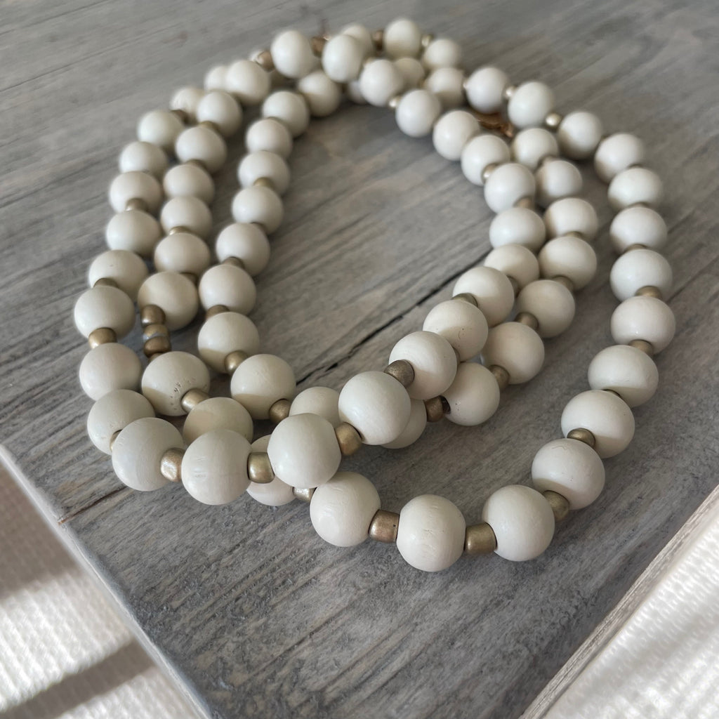 Long cream wood beaded necklace