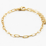 Gold chain bracelet on a white background