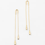 Gold chain threader earrings with teardrop pendants on a white background