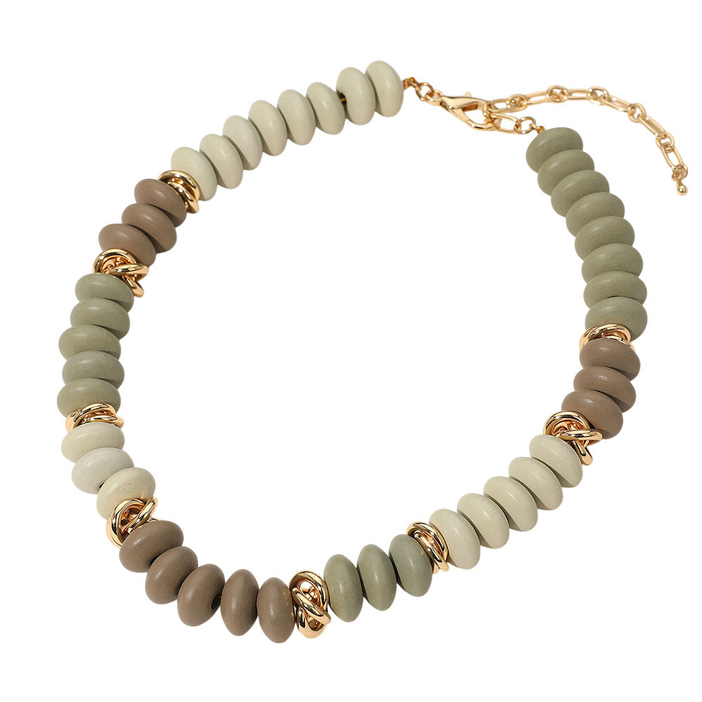 Necklace with beige beads and gold accents on a white background