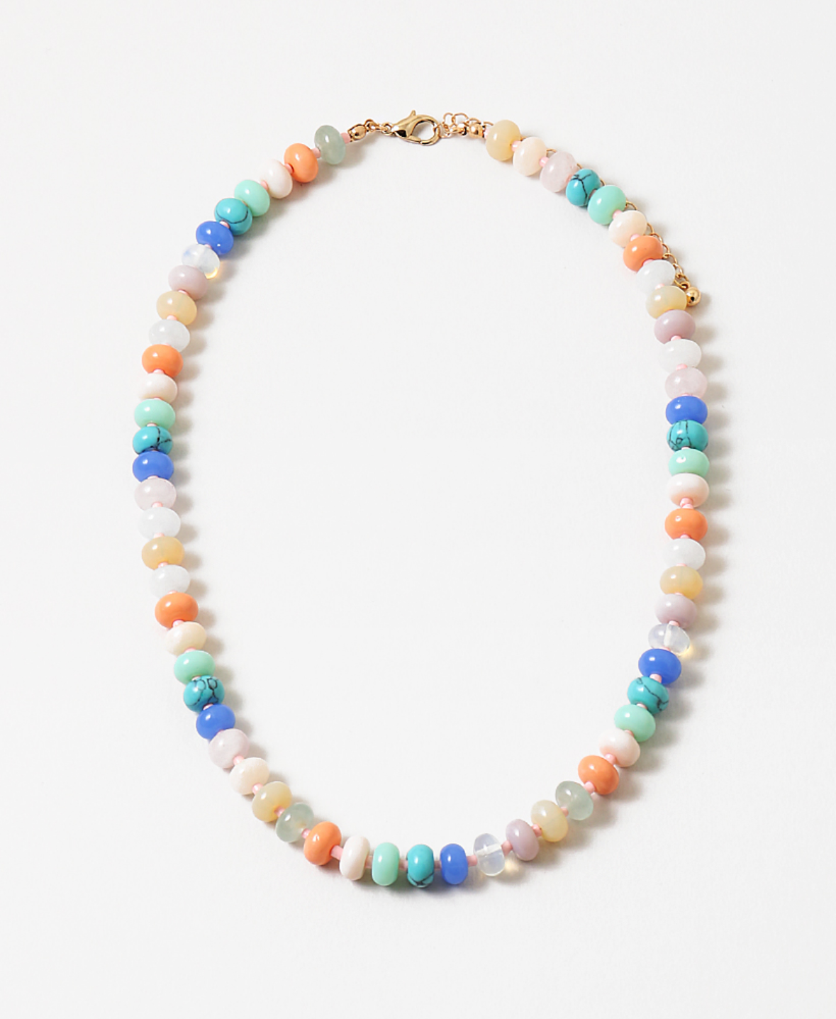 Multicolor semi-precious stone bead necklace in whites, cream, coral and blues.